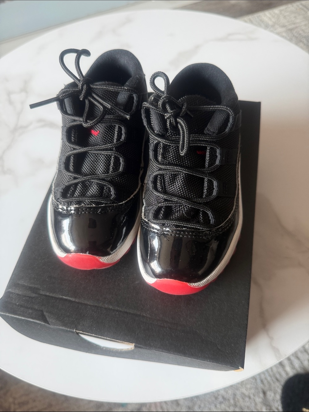 Kids Black and Red Low-Top Athletic Sneakers